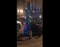 Person on stilts with disco ball outfit 