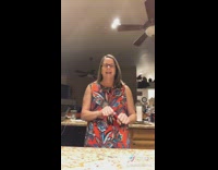 Two girls and her family hit the Woah dance in their kitchen