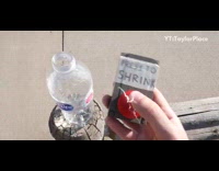 Guy shrinks himself plastic water bottle outdoors 