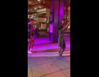 Woman dance in front of camera placed on the stroller