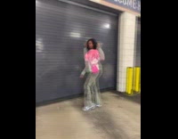 Guy posing in front of garage door opening