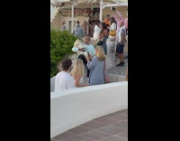 Man blue sweater pet dog sits on lap stairs
