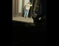 Guy pees near entrance 