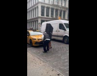 Woman wears huge shopping bag for photoshoot