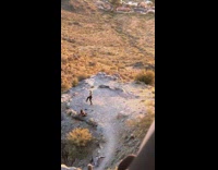 Woman workout outfit dance grasslands sunset