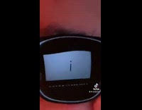 Guy zooms in on black sunglasses laptop 