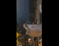 Man climb up roof and dance cheer