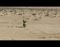 Little kid falls off dirt bike 