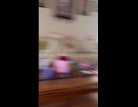 Woman playing red light green light with cat