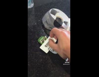 Man Tapes his ID Card on Toy Skateboard