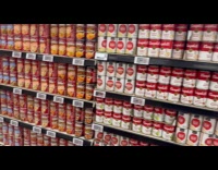 Submitter shows organized canned goods in supermarket