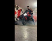 Collab SendItOfficiall - Guy revs engine red motorcycle canadian flag 