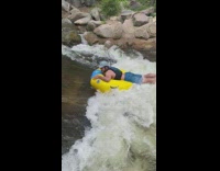 Guy on tube in river scorpions when going against current