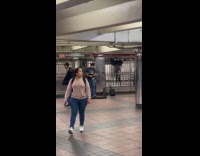 Man interrupting another man performing 