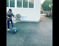 Collab Kale Salad IG -  Boy rides rollerblades on scooter
