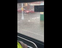 Filmer ride bus shows flood on street