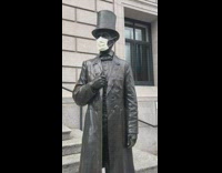 Abraham Lincoln statue wears yellow face mask