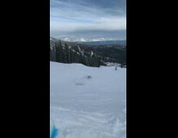 guy on skis plummets on snow 
