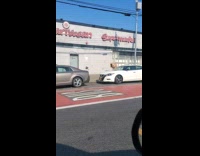 person wears cardboard box as shirt