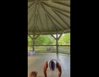 Little boy joins man in workout at park 
without text 