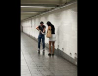 Man and woman wring out wet cloth