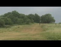 Black shirt guy bicycle grass hill fail 