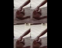 Girl pushes box with puppy inside carpet