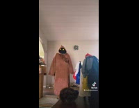 Collab BitchIG2 - Guy puts on brown robe black face mask yellow eyes