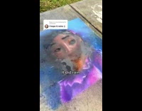 Beautiful chalk drawings on sidewalk wash away in rain 