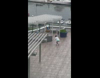 Woman white jacket grab air laptop docks