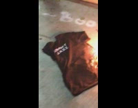 black jimmy jazz shirt lit on fire 
