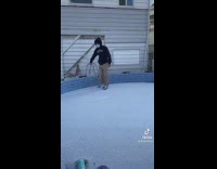 Guy walking and dancing on pool covered in snow