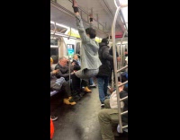 Woman hangs on handrail entire subway ride
