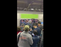Collab Subway Creatures - Woman shoves herself into crowded subway train and gets back stuck between closing doors