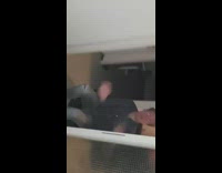 Two guys race black chairs mario kart