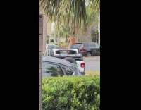 Woman red bikini convertible roof car photo shoot