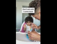 Little girl do not eat goldfish