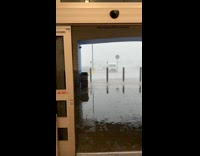 Shopping carts blown across parking lot storm 
