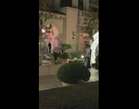 Guy in water fountain run from security