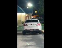 Car with Thot Patrol sticker text on back