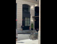 Collab IITW - Woman bikini with helmet models at sidewalk