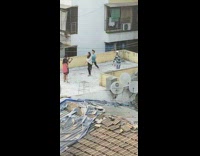 Three kids make dance tiktok rooftop building