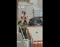 2 people in bunny head costumes pose for photos 