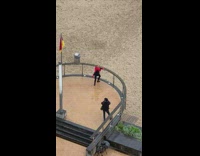 Woman red scarf jacket ballet warmup beach park