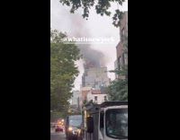 Submitter shows burning building