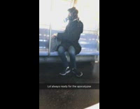 Guy wears gas mask on subway train ready for the apocalypse 