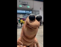 Woman cosplaying as marcus the worm 