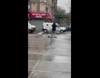 Man Plays Trumpet in the Rain 