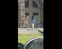 Woman pink dress pose near white door part 1