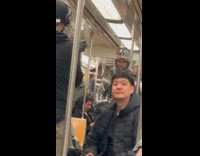 Man wearing knight armor costume on subway